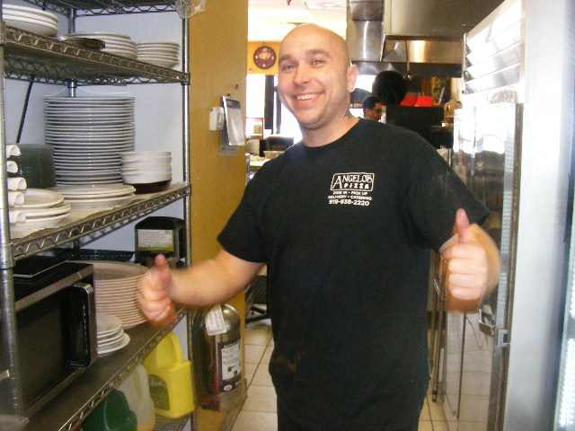 Owner Chef Thomas giving a thumbs up